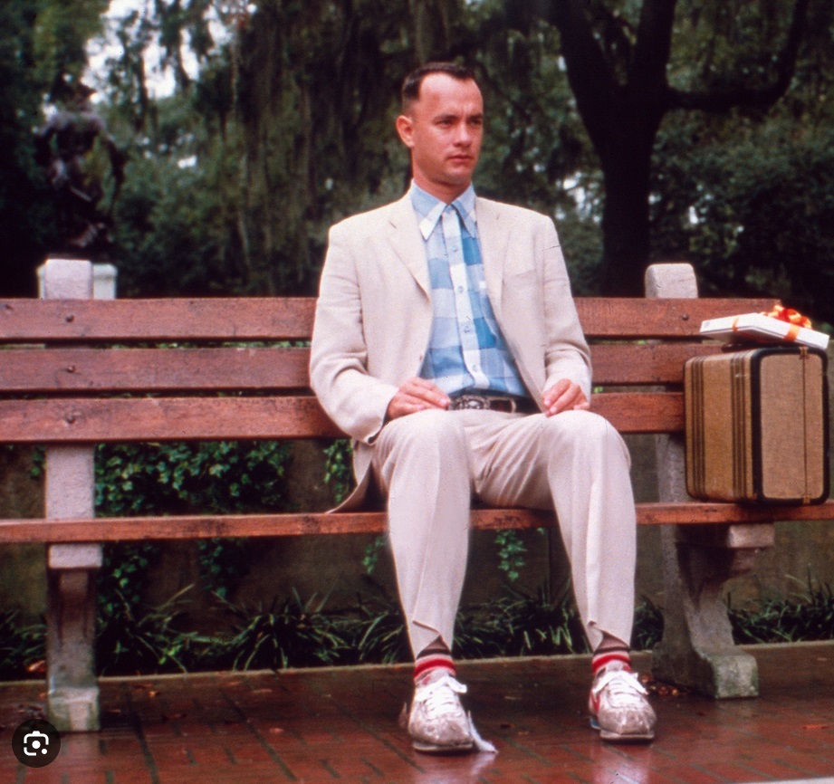 This is a picture of Forrest Gump sitting on bench